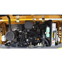 Yuchai Americas excavator engine compartment showing detailed view of the motor, hydraulic systems, and filters