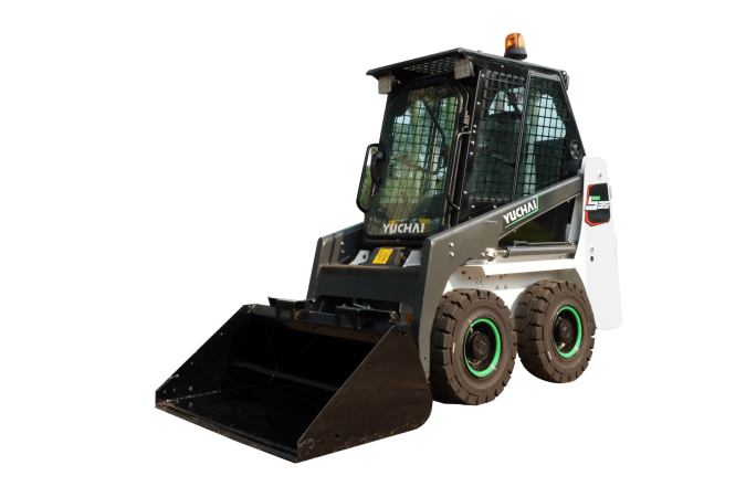 Yuchai Americas S35 skid steer loader with enclosed cab, black front bucket, and four large tires with green-accented rims